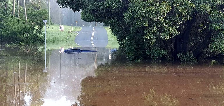 Image #1: Submerged vehicle in the Albert River near Luscombe as photographed by EWN Alerts Operator and Forecaster Justin Noonan, Friday 14th February, 2020