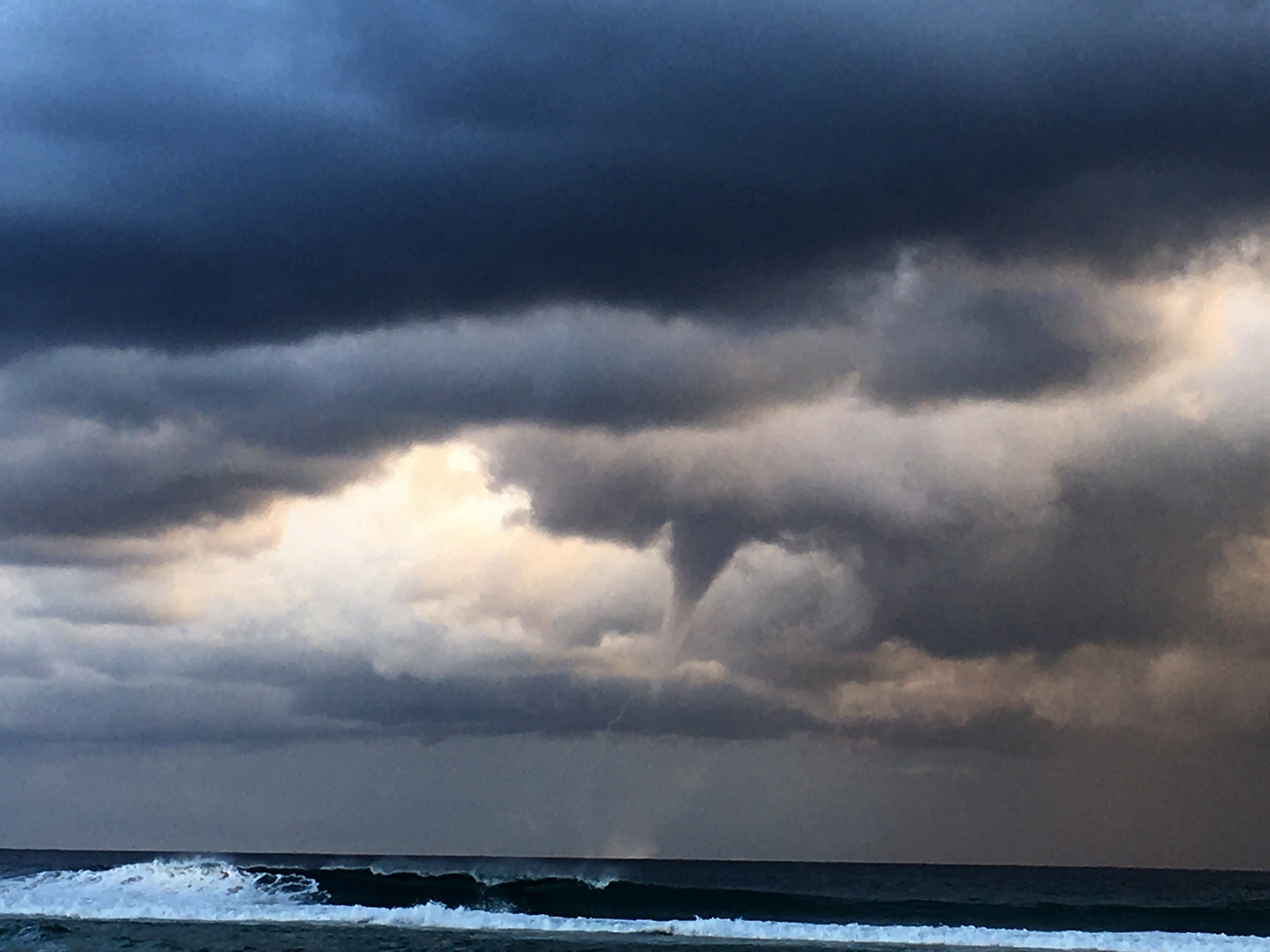 Touchdown! Ben McBurney captures this v-shaped waterspout off Cabarita Beach, Northern NSW yesterday, Thursday, 14th May, 2020.